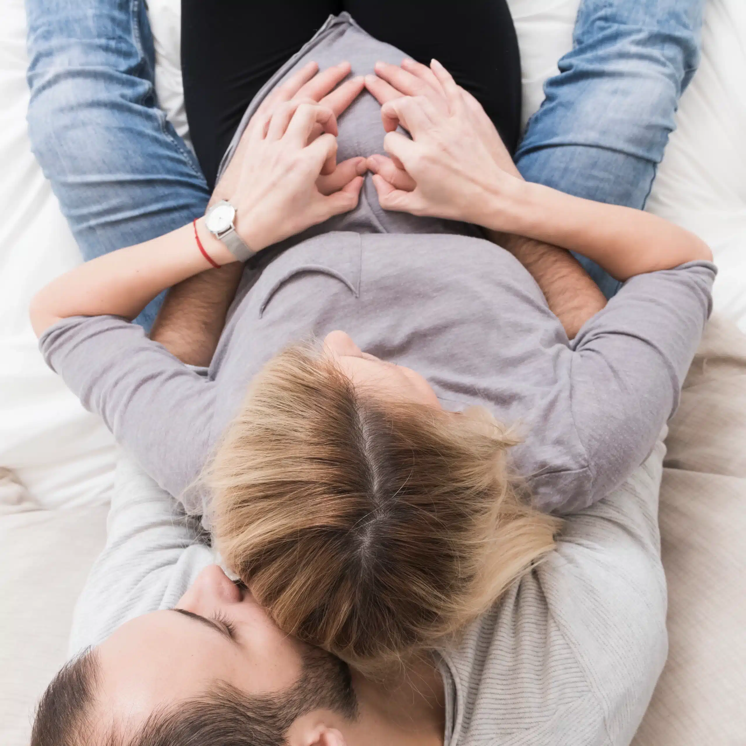 top view pregnant woman husband scaled